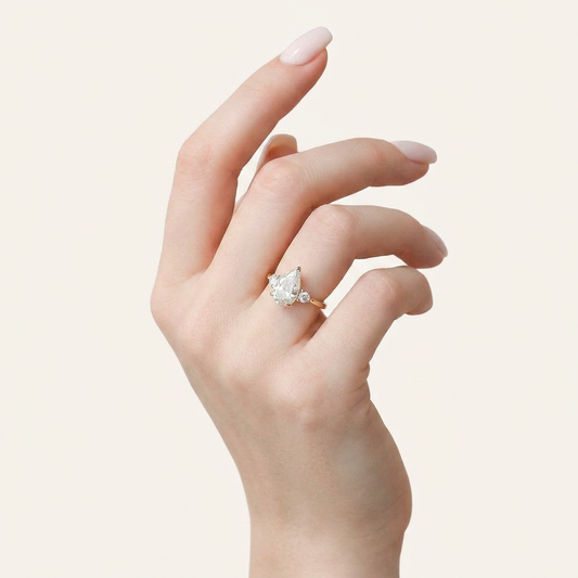 Moissanite 2.00 CT Pear & Round Cut Diamond Three Stone Ring