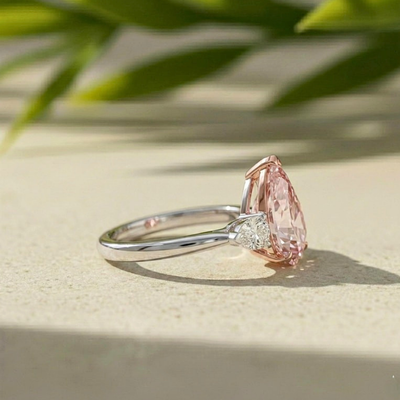 Fancy Pink Color Lab Grown Diamond 5.00 CT Three Stone Pear Cut Engagement Ring