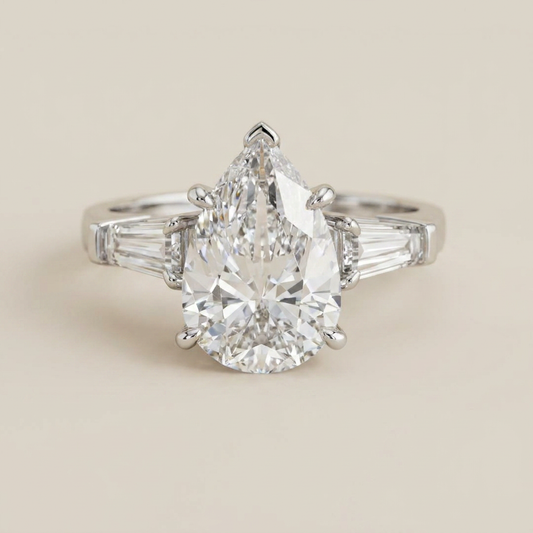 Moissanite 3.95 CT Pear & Tapered Cut Diamond Three Stone Ring