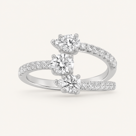 Lab Grown Diamond 1.00 CT Round And Pear Cut Three Stone Ring