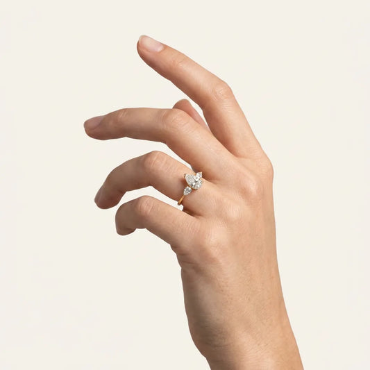 Lab Grown 1.50 CT Pear Cut Diamond Three Stone Ring