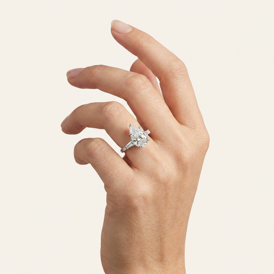 Moissanite 3.66 CT Pear & Tapered Cut Diamond Three Stone Ring