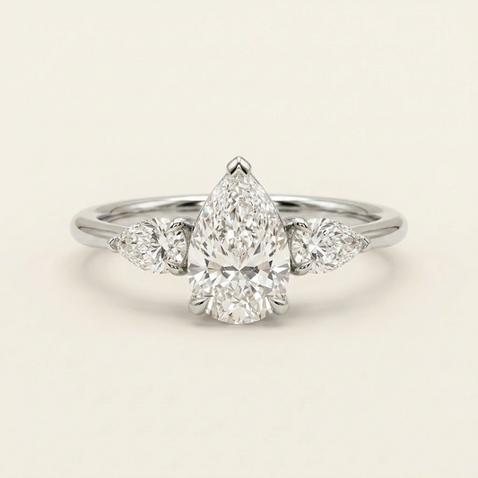 Lab Grown 1.50 CT Pear Cut Diamond Three Stone Ring
