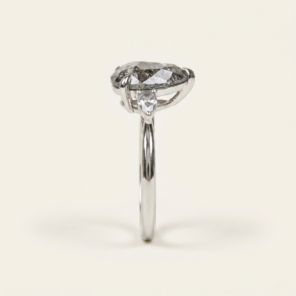 2.18 CT Pear Cut Salt and Pepper Diamond Three Stone Ring