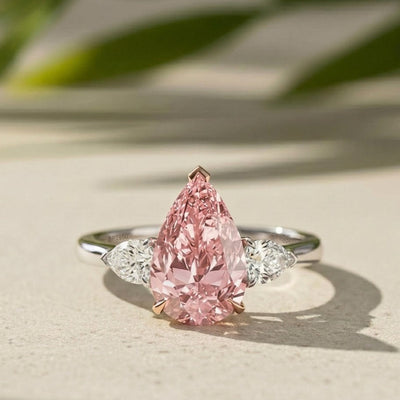 Fancy Pink Color Lab Grown Diamond 5.00 CT Three Stone Pear Cut Engagement Ring